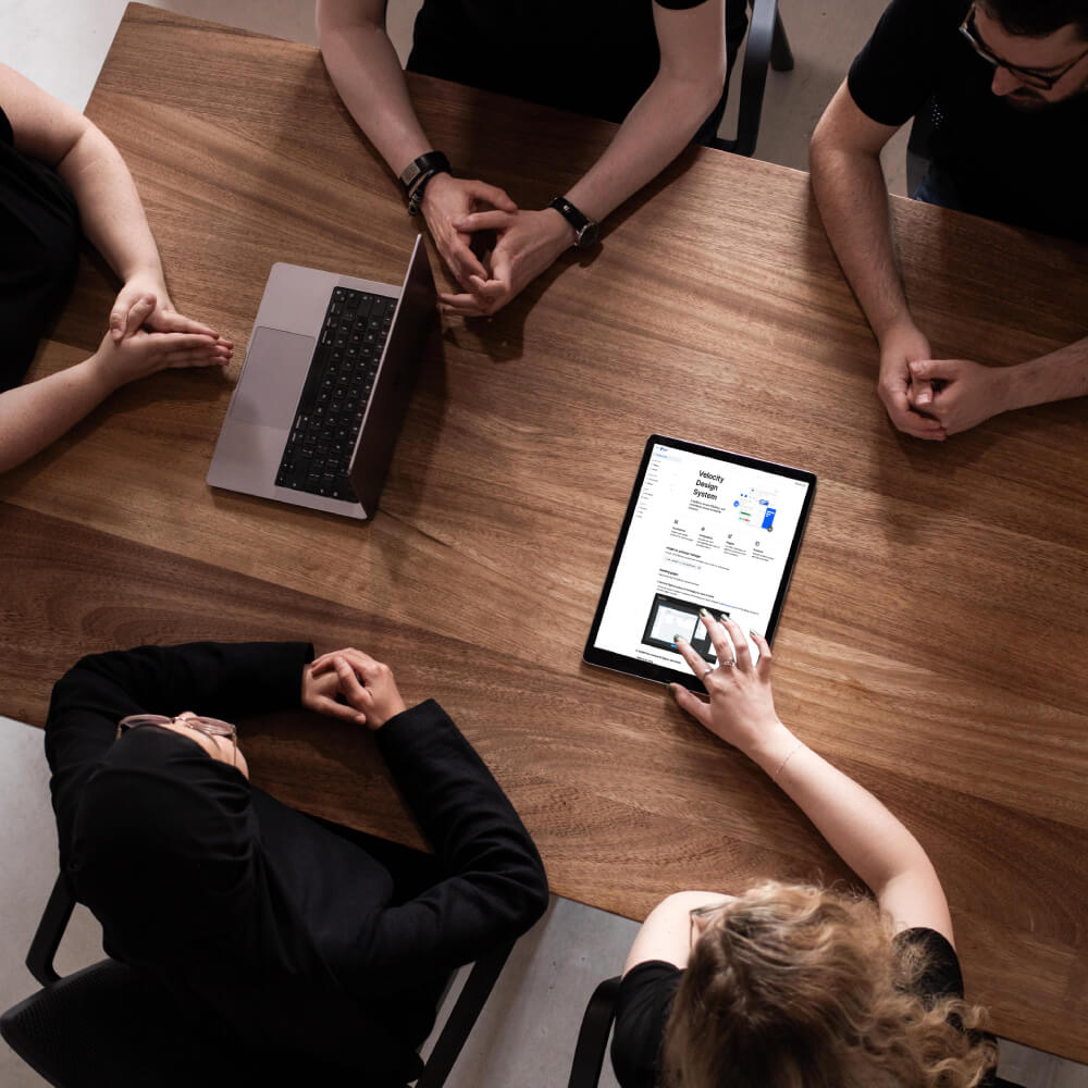 Top down view of people sitting around a table